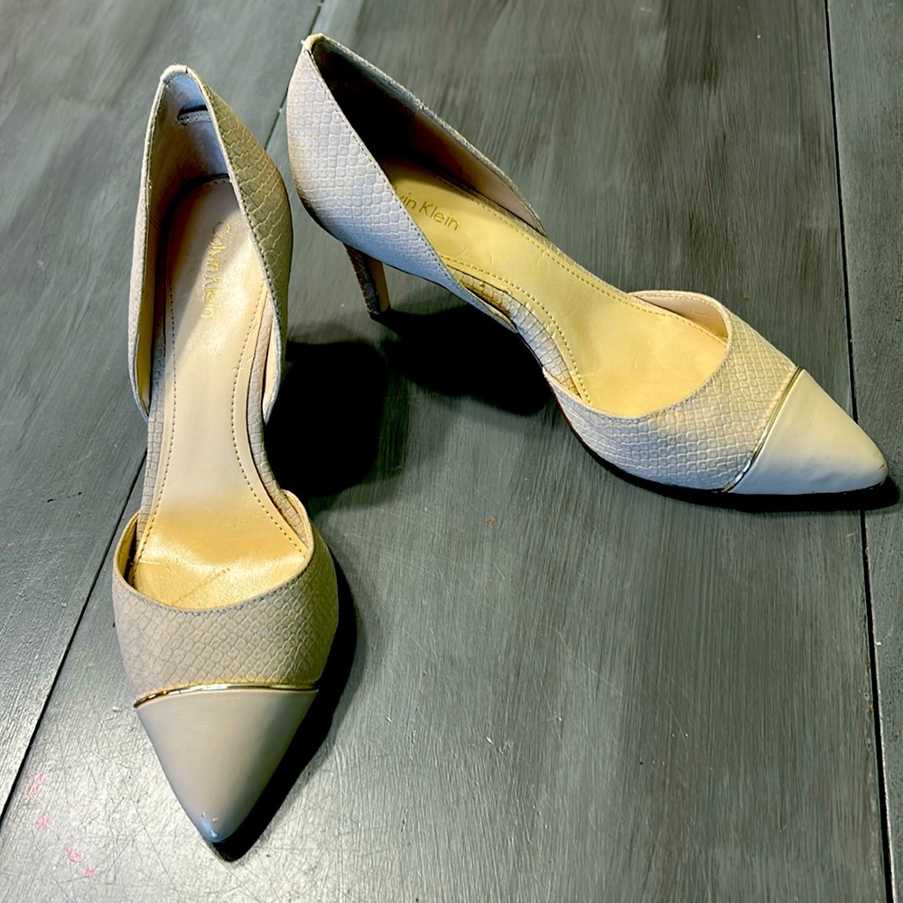 Nude point toe pumps.
